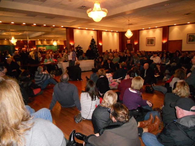 Not a reading rug in sight. Commissioner Dotty Lewandowski speaks to the crowd.